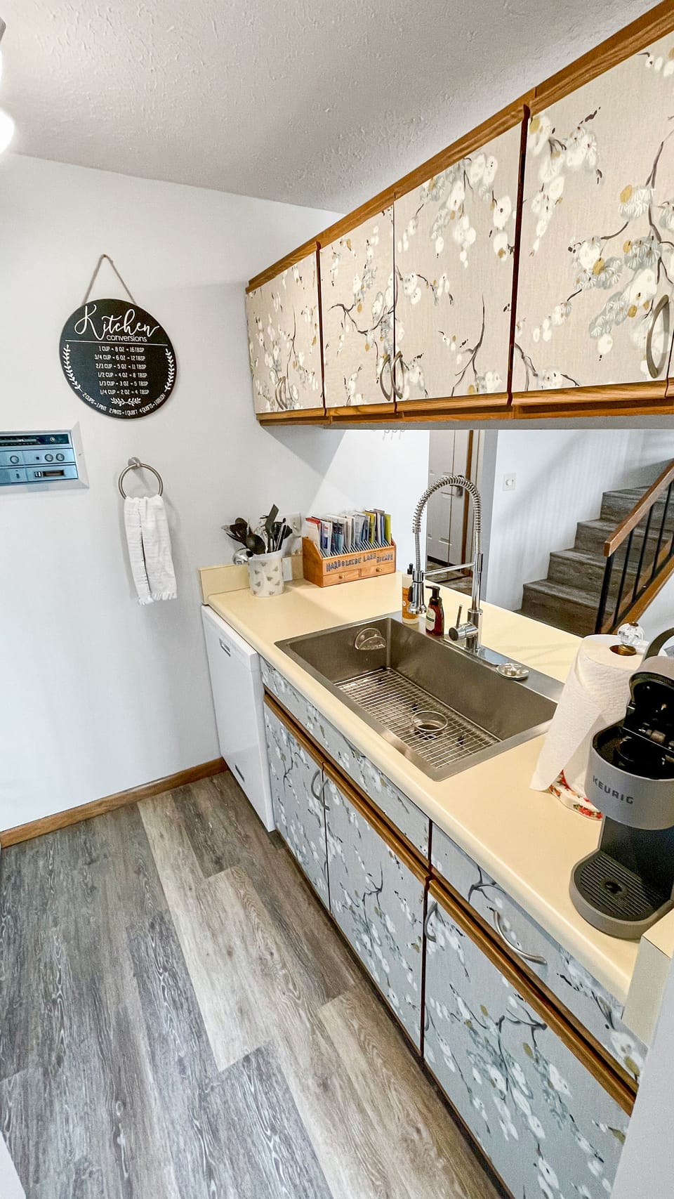 Galley style kitchen is fully equipped with a Keurig coffee maker and toaster.