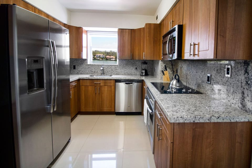 Prepare meals together with generous counters and modern finishes.