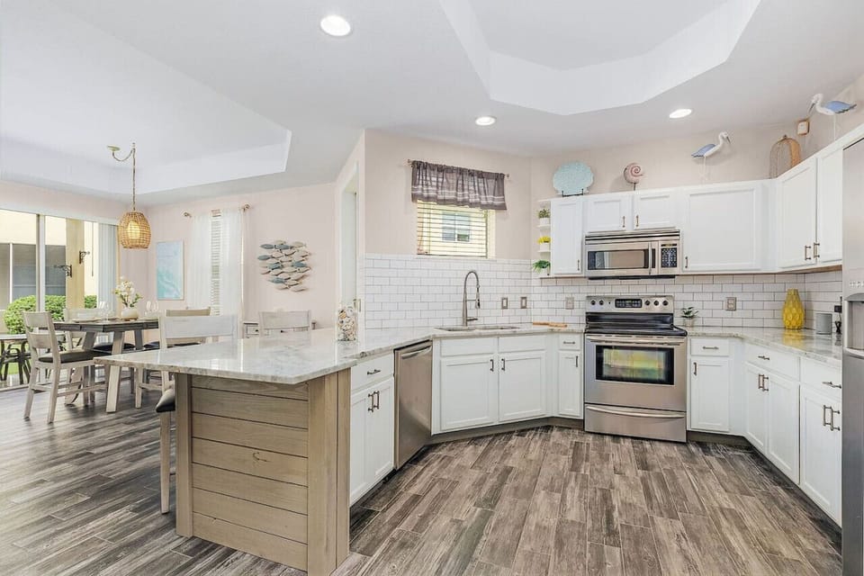 Chat with the chef and enjoy this modern kitchen with clean lines