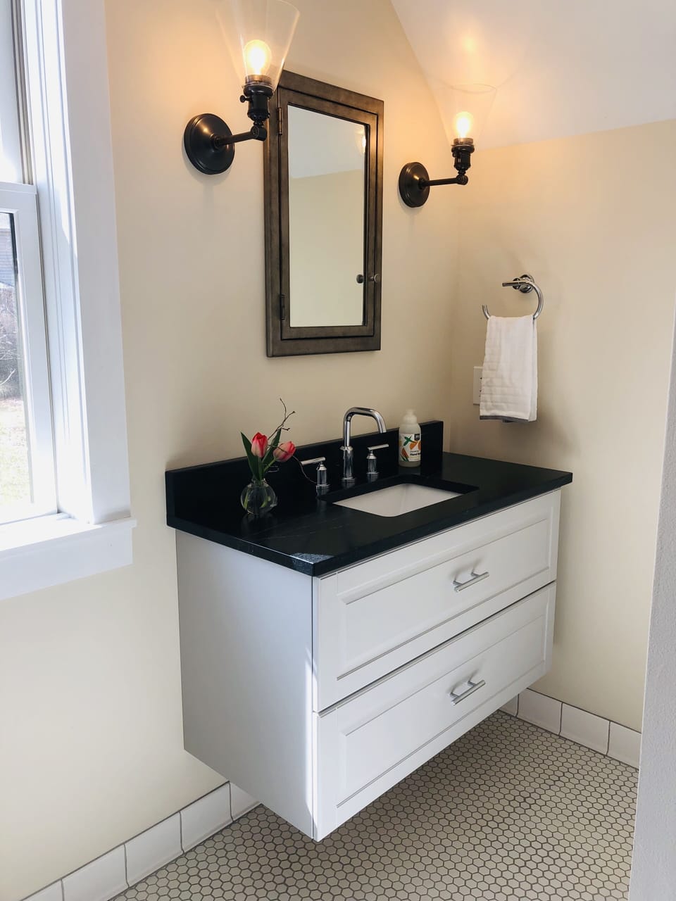 Bathroom that feels like a mini spa with even custom locally sourced soap.
