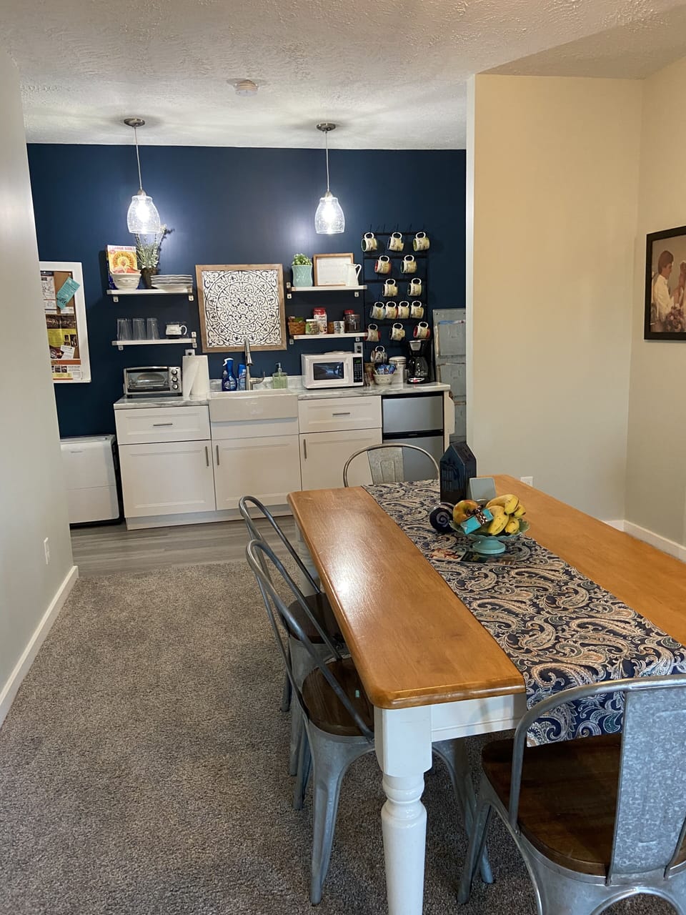 kitchenette & dining room table; continental breakfast bar included