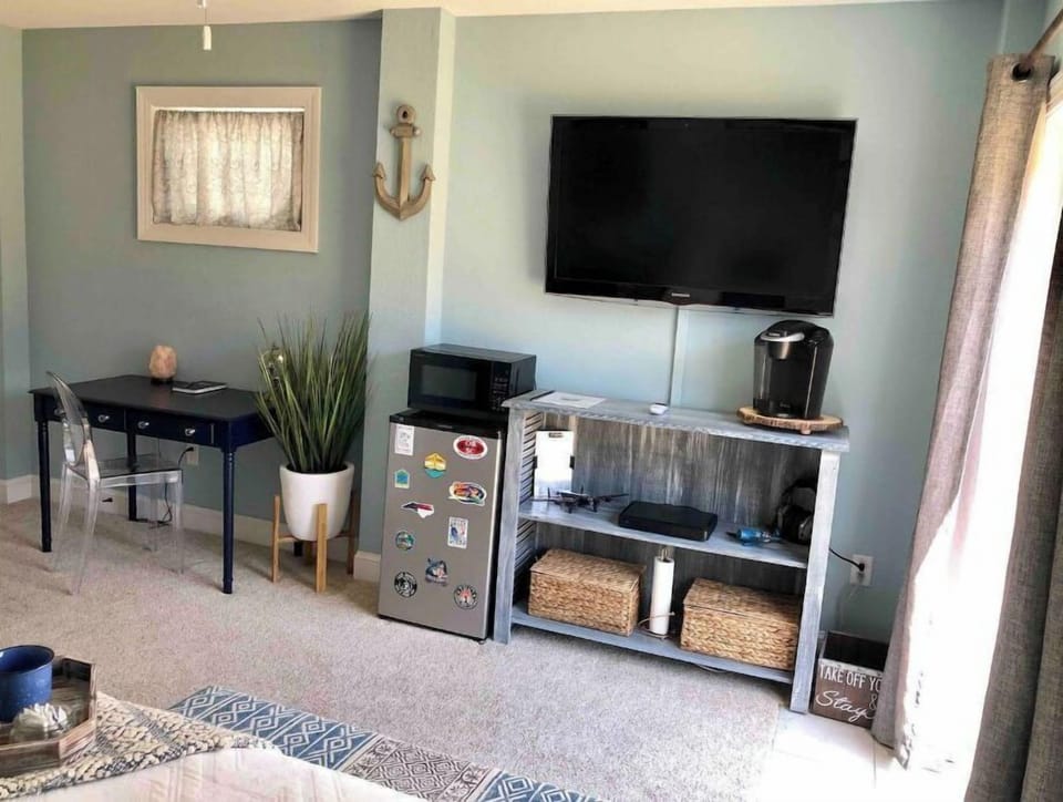 Mini fridge, microwave, & Keurig Coffee maker. Coffee & water are complimentary