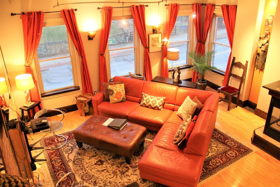 Great Room with 12 foot ceilings and large windows.