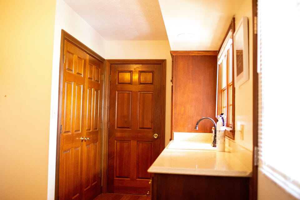This utility space is next to bedroom 6. Laundry unit is available to guests. 