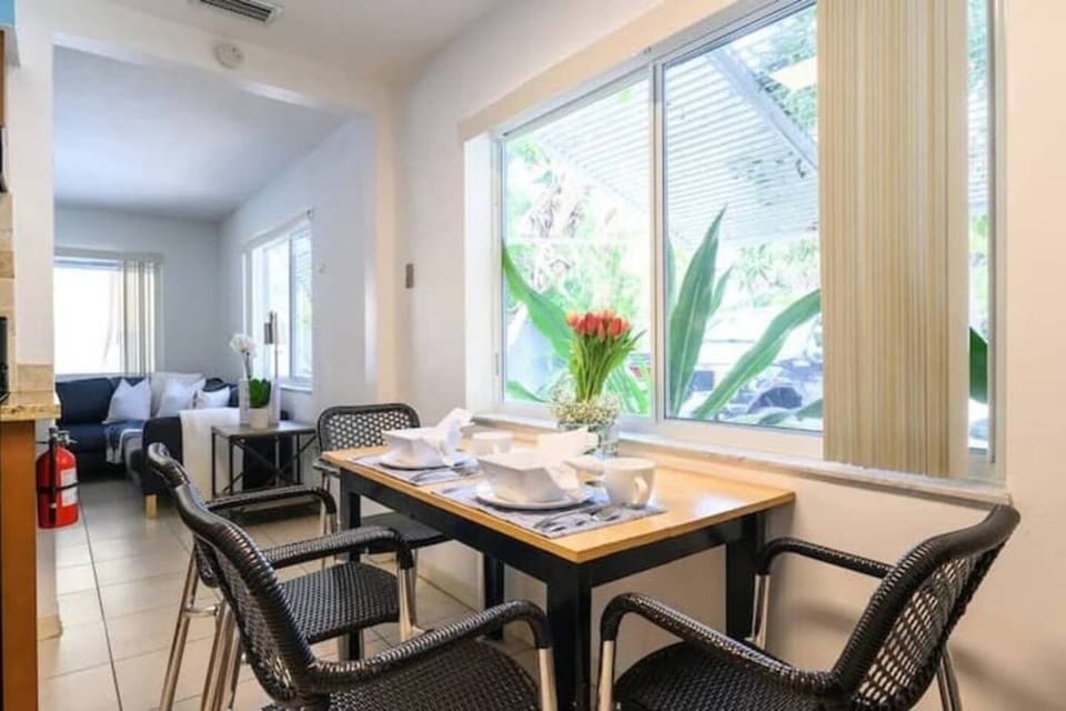 Dining area right off kitchen seats. 