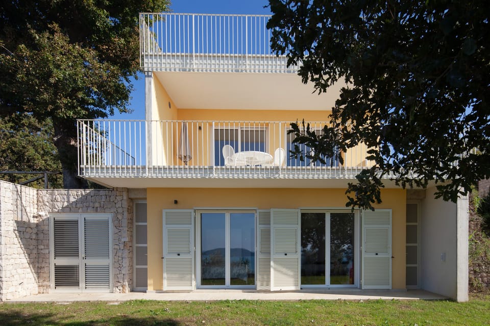 The external view: Solarium, Sitting room ope space, and bedrooms at garden lev.