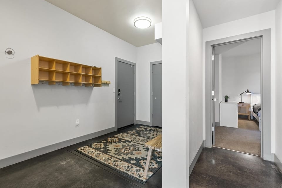 Garage entry and downstairs hallway view