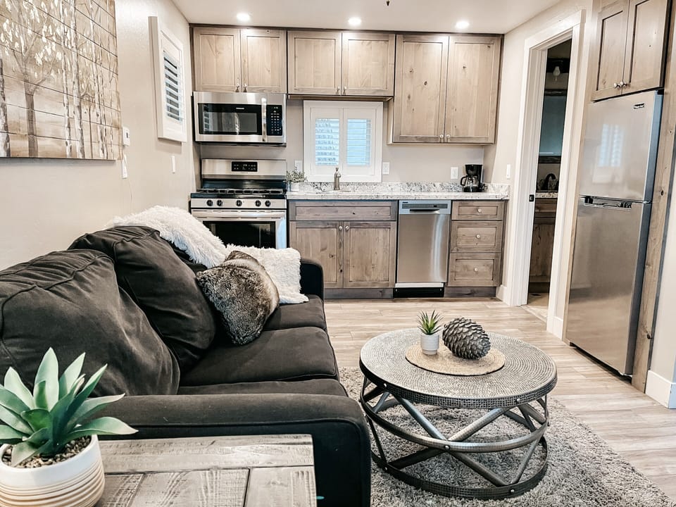 Family room and kitchen. Bathroom to the right of kitchen. 