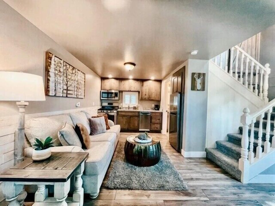 Family room, kitchen, BA on ground level. Loft BR + sleeping nook upstairs.