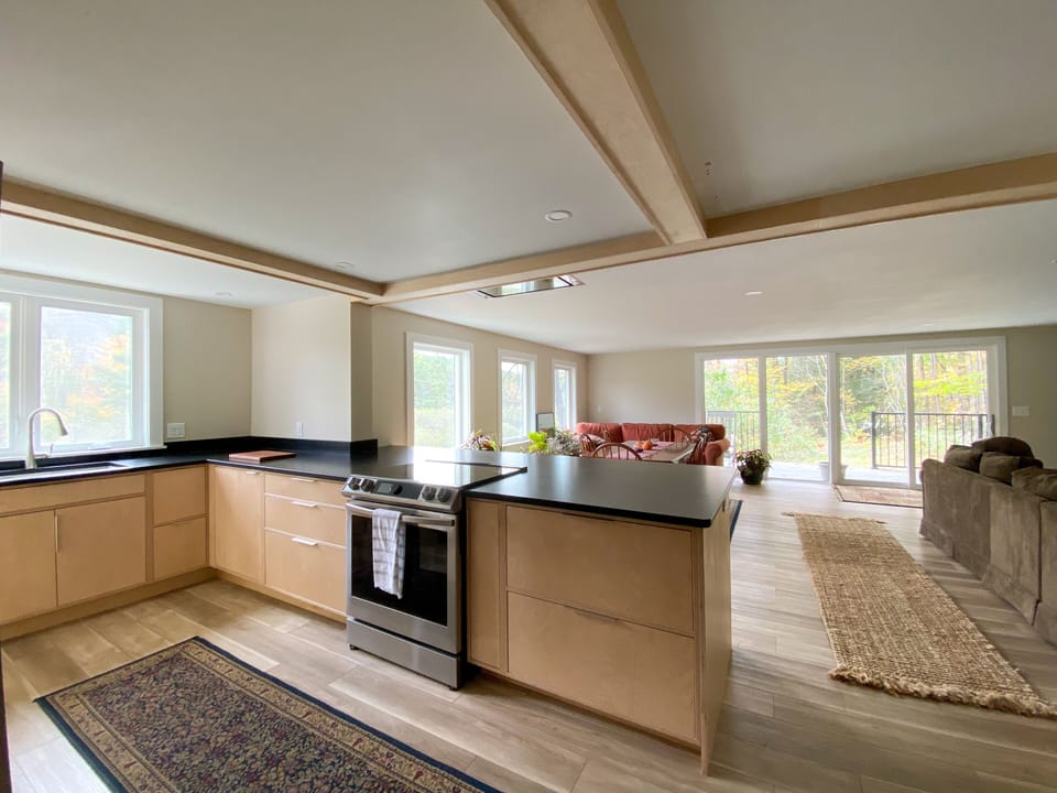 Custom kitchen with all new appliances & a view.