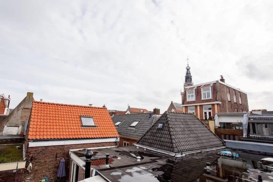 Stunning views over historic Alkmaar from the private rooftop terrace – the perfect spot to unwind."