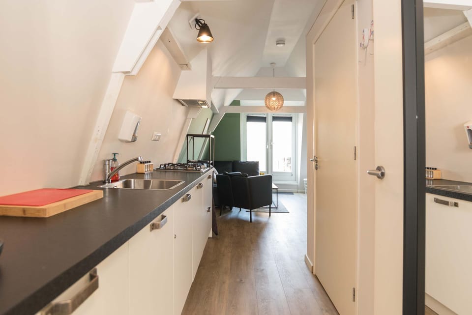 Modern kitchen setup with all essentials for a convenient and enjoyable stay.