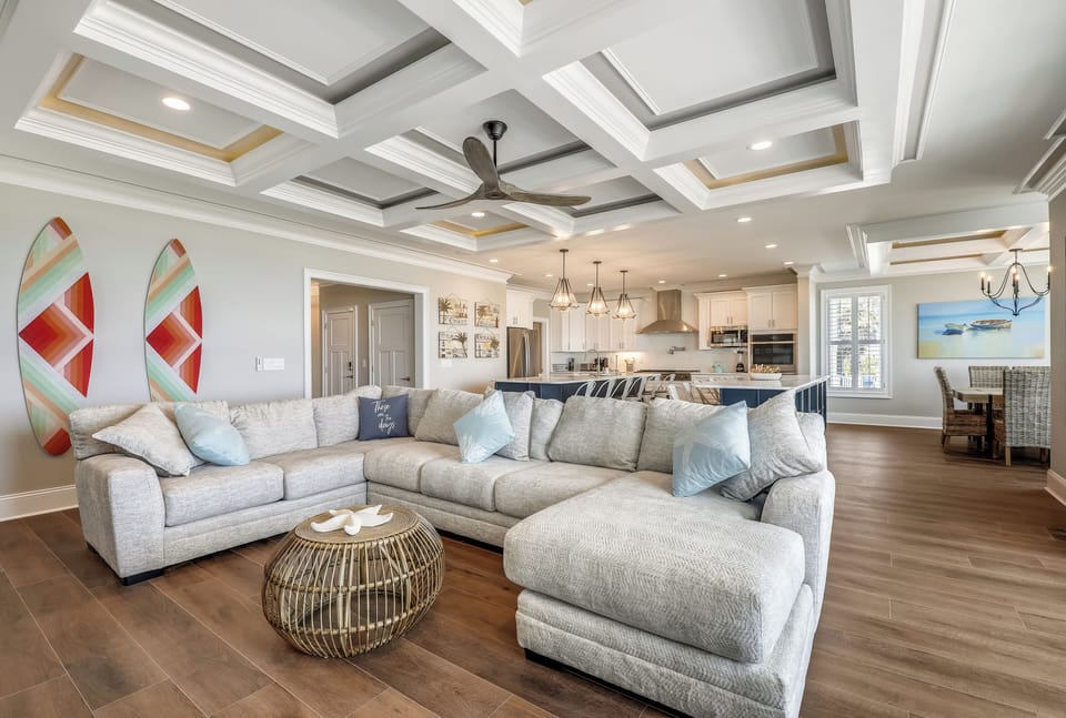 The ocean front living room is well-appointed with comfortable furnishings.
