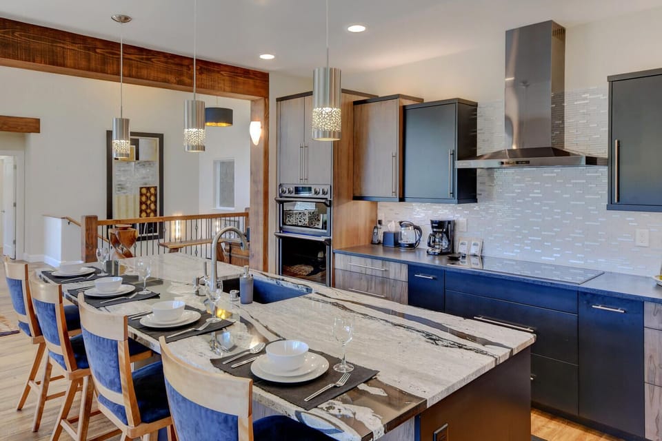 Fully Equipped Chef's Kitchen and Bar Seating