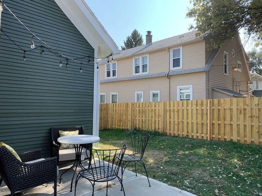 Chill out with string lights in your private, fenced backyard.