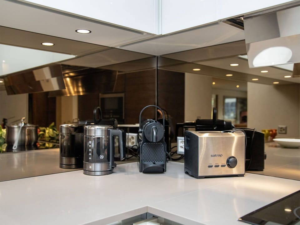 Kitchen Appliance, Kitchen, Interior Design, Countertop, Small Appliance, Lighting, Home Appliance, Ceiling, Light Fixture, Coffeemaker