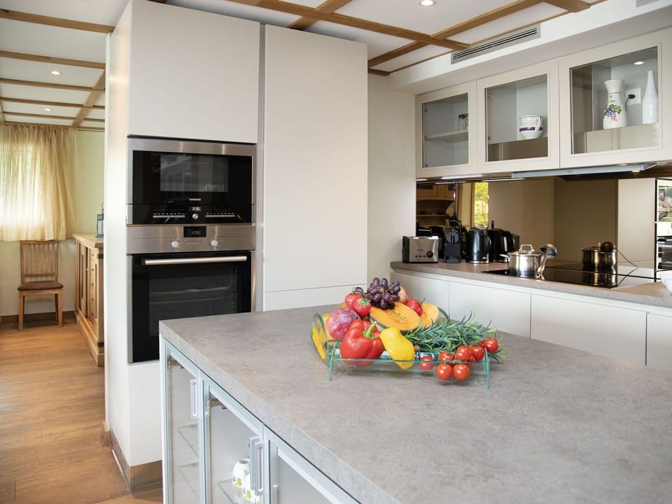 Kitchen, Countertop, Kitchen Appliance, Furniture, Cabinetry, Interior Design, Flooring, Wood, Home Appliance, Major Appliance