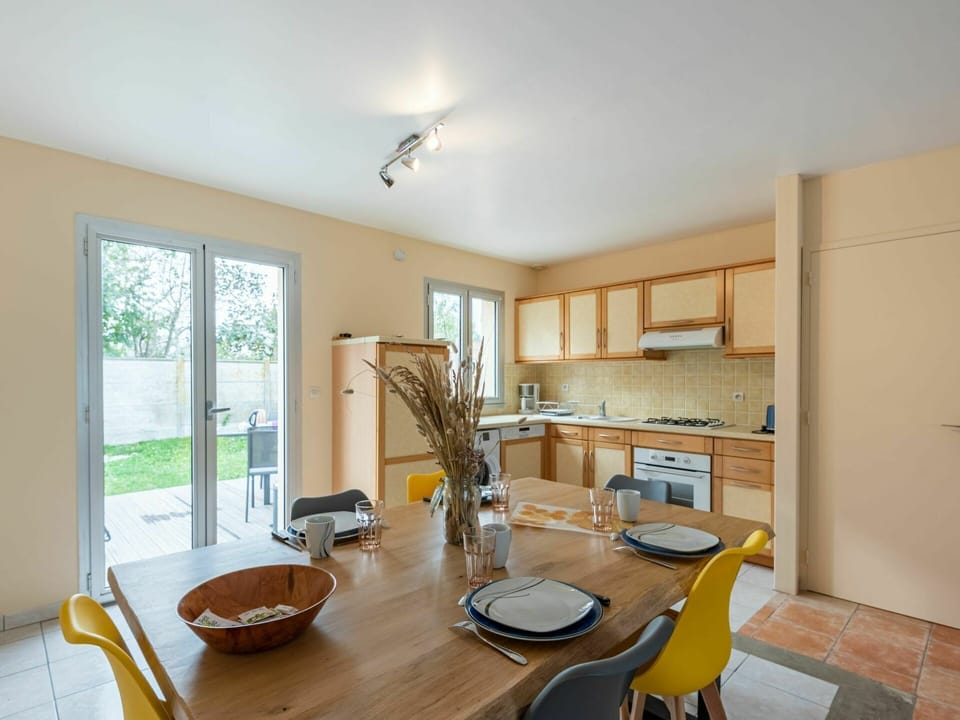 Table, Furniture, Property, Cabinetry, Chair, Countertop, Wood, Window, Lighting, Interior Design