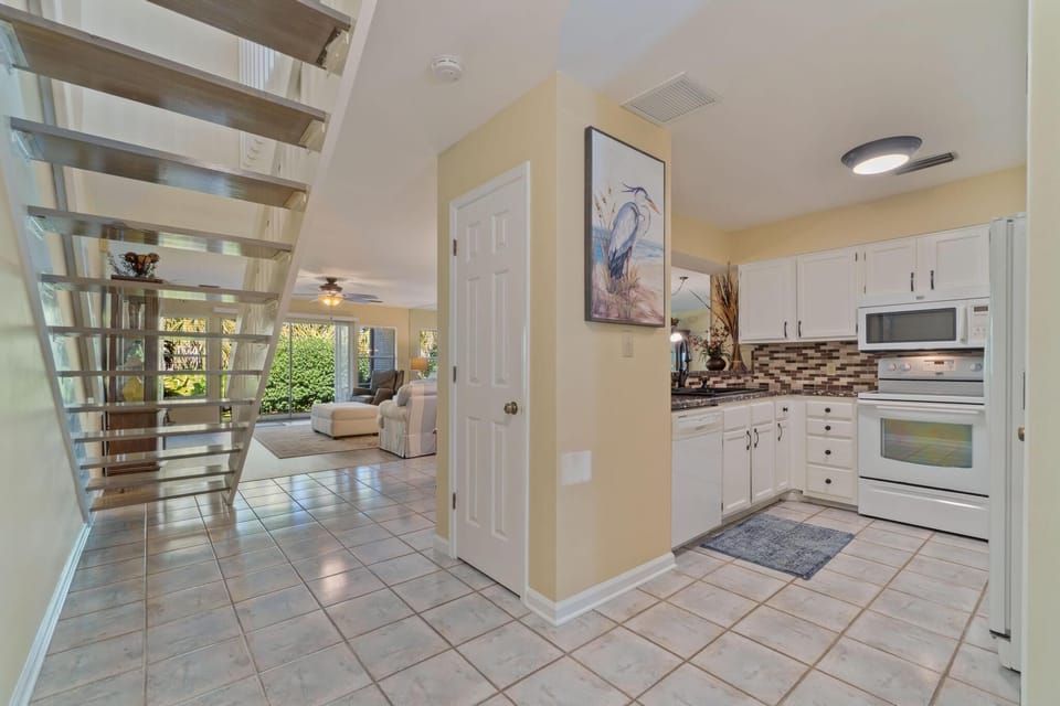 View into kitchen, main living room