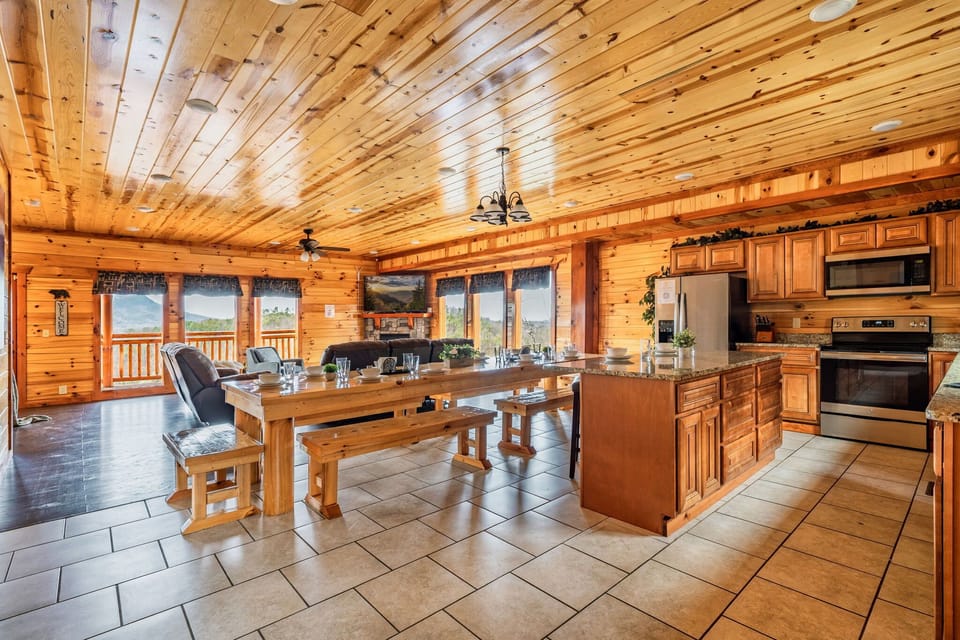 【Expansive Living + Dining Area】Large dining table accommodates all your guests with additional seating in the living area