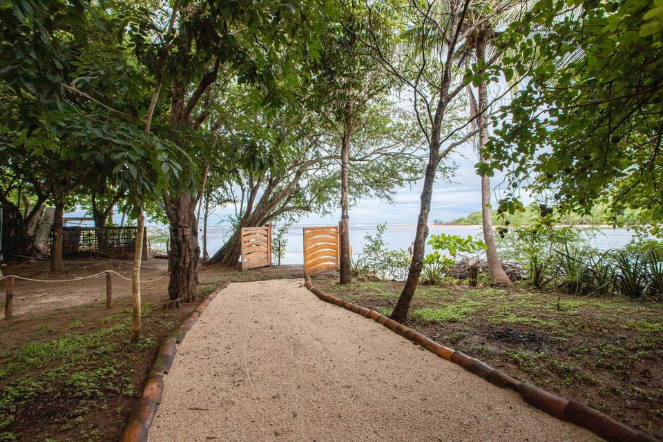 Steps from the beach with ocean views from the pool area!
