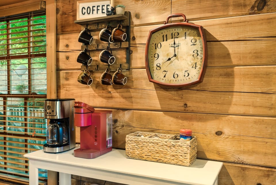 Coffee bar with coffee maker, keurig, limited staples (k-cups, sugar, creamer).