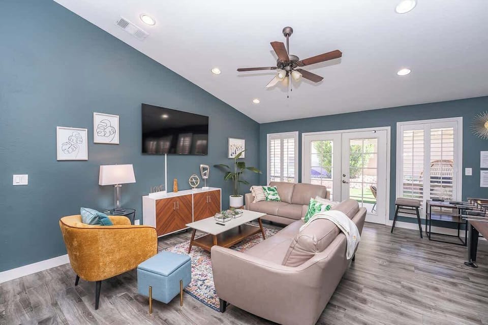 Our living room includes modern design, high-speed internet, and a plush sofa and chairs!