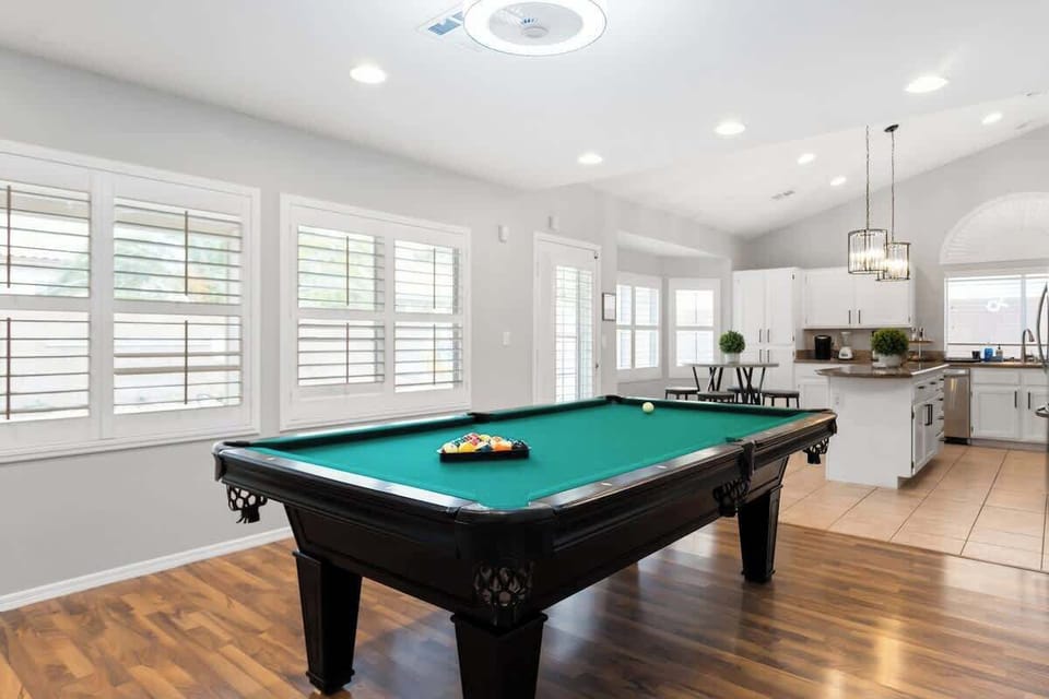 Grab a beer and think of a conversation starter because the pool table will round out your indoor entertainment.