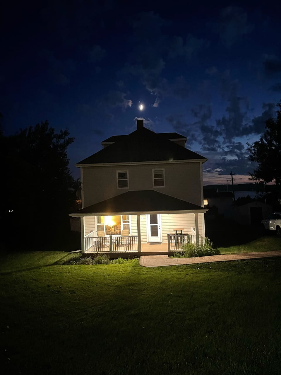 Front of house, night time street view