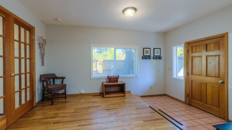 Entryway with wood flooring.