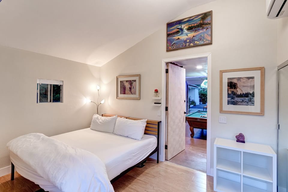King bed with luxury linens, Large 75" TV and private bath
