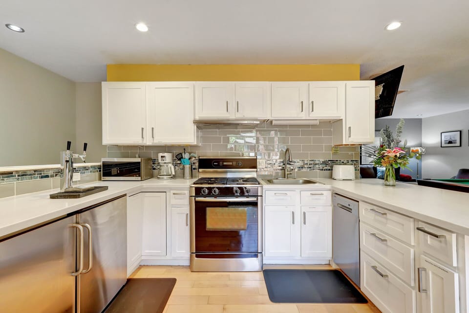 Full kitchen with dishwasher and microwave