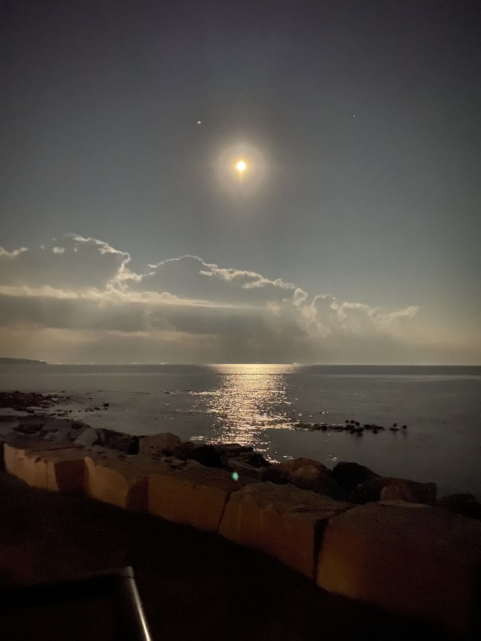 Moon at night while sitting on the deck.