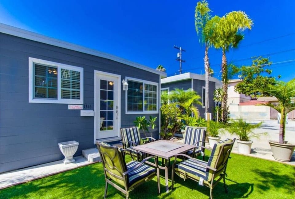 Cottage 3 has a nice front yard turf with firepit