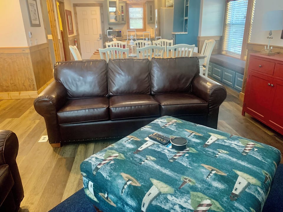 Living area is equipped with a queen-sized sleeper sofa for extra sleeping space