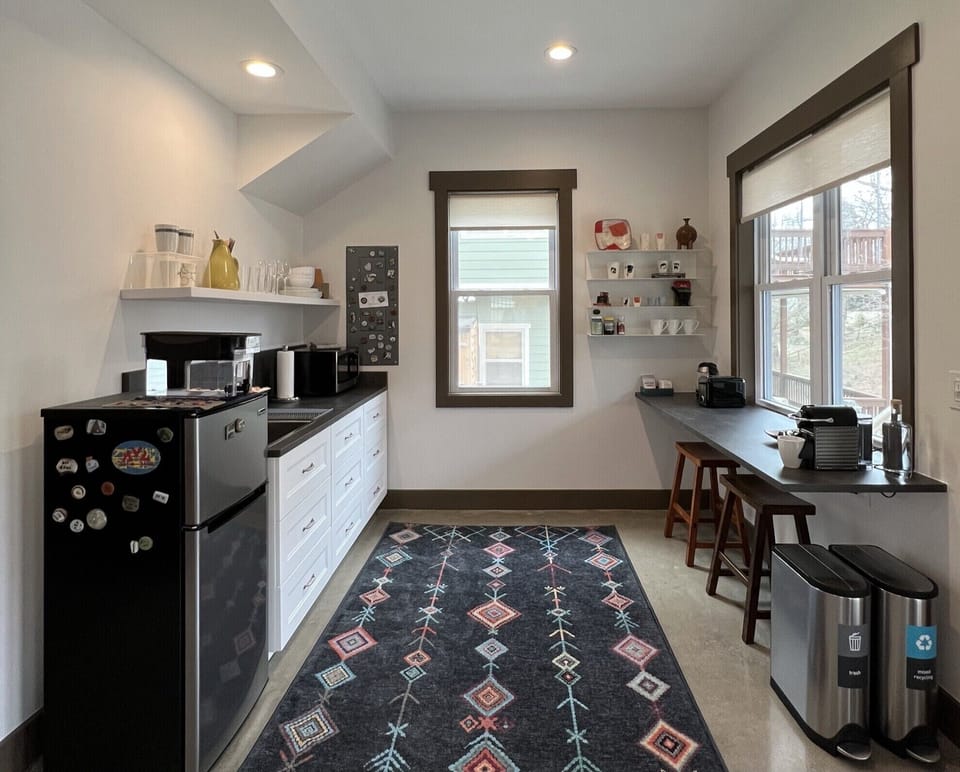 Full-featured kitchenette - microwave, tea kettle, toaster and coffee maker. 