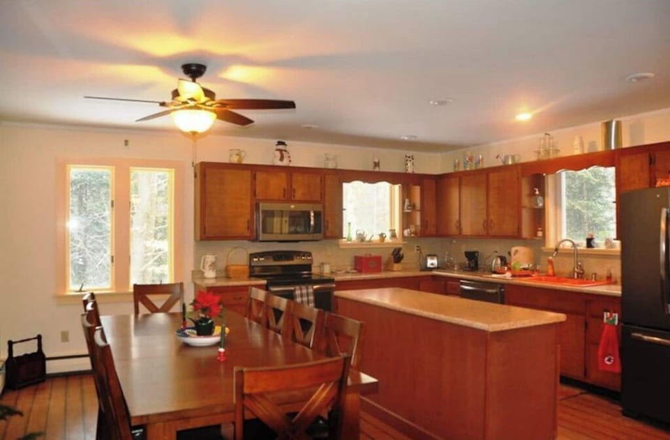 New stove, fridge, dishwasher, and Island in Kitchen