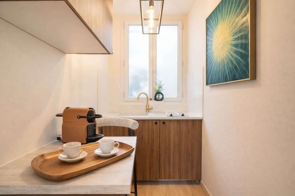Nespresso coffee machine available with cups.