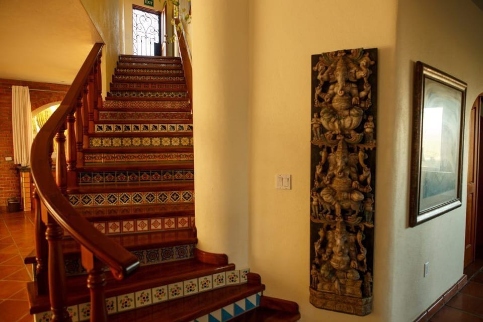 Staircase in the meditation hall/ living room.  Leads to Sunrise & Sunset rooms