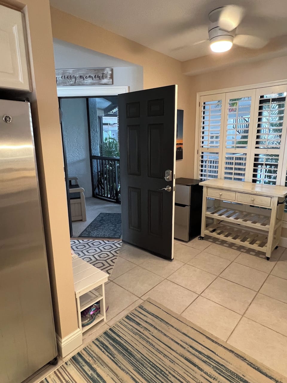 Walk into open space & laundry area.  With a convenient table to fold clothes.