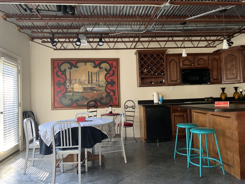 Stove, microwave, refrigerator, ice maker, coffee or tea station.