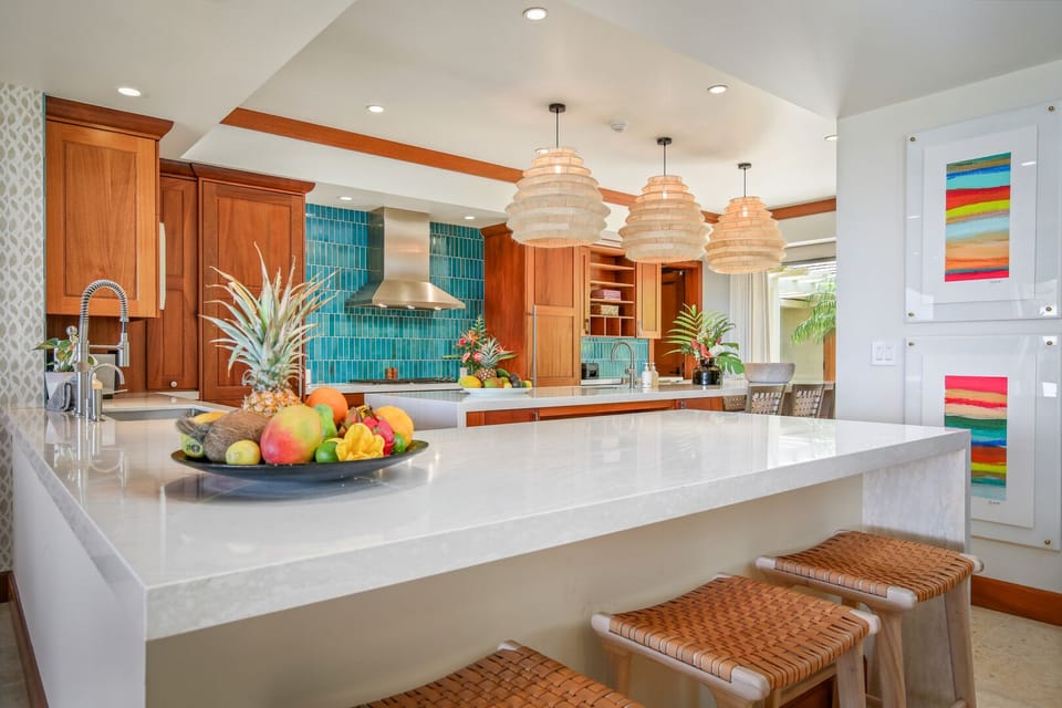 Top tier appliances throughout, this generous kitchen is the perfect hub for this flawless home.