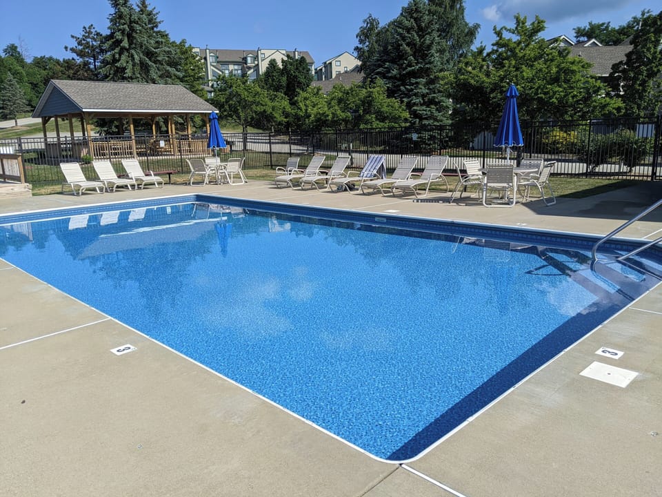 Private community pool steps away
