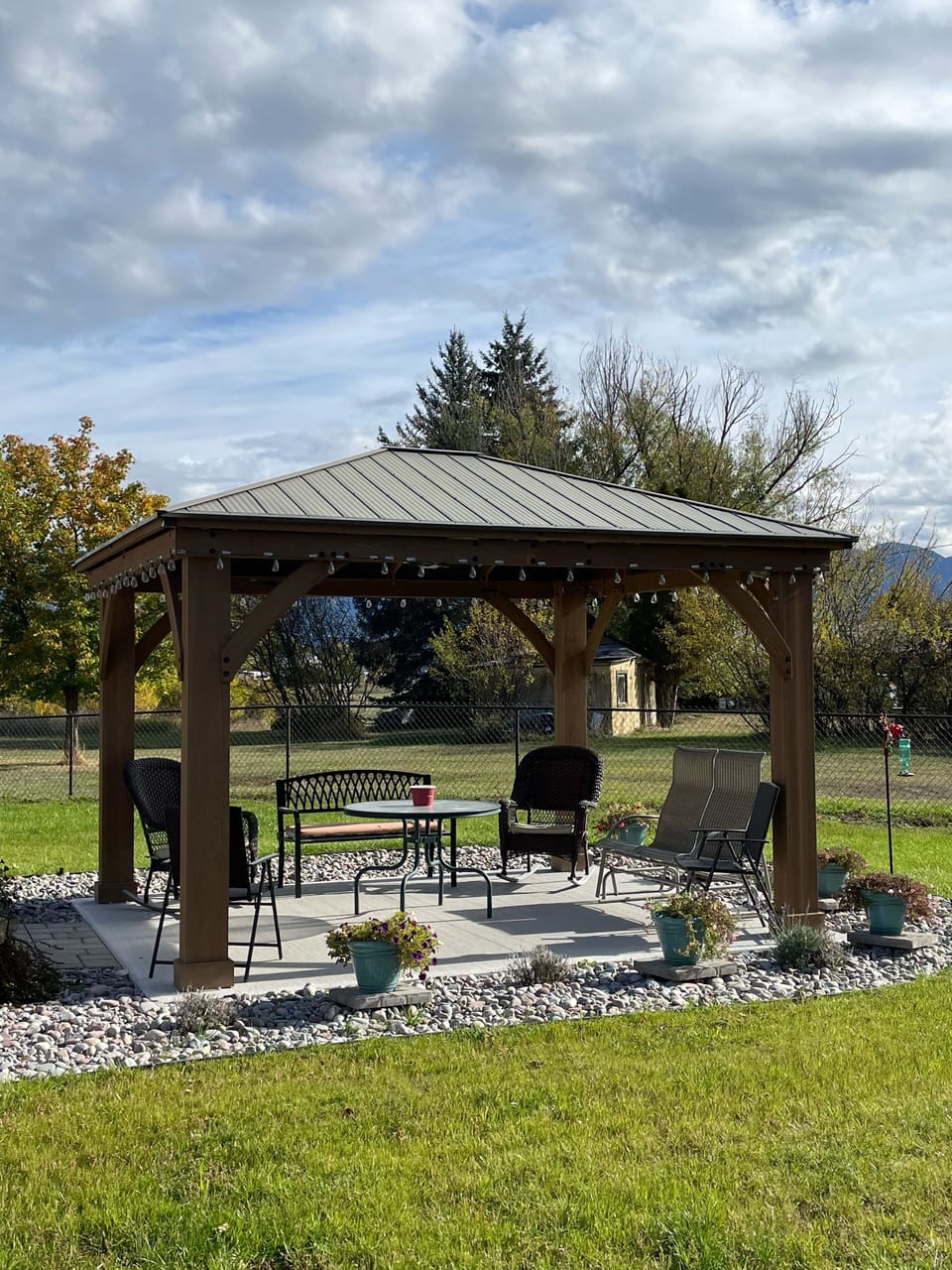 Gazebo with lighting and fan for warm summer nights. 