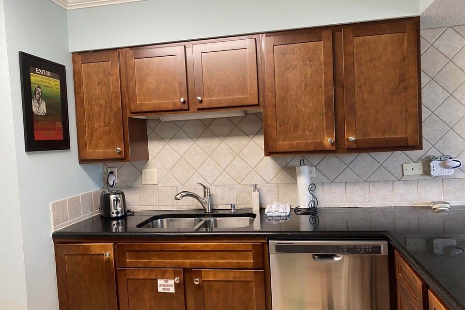  kitchen with dishwasher, pots, dishes, coffeemakers, blenders-everything!