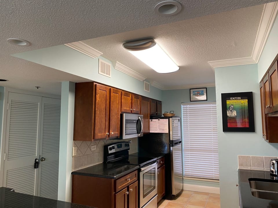 Fully equipped kitchen with Stove & microwave