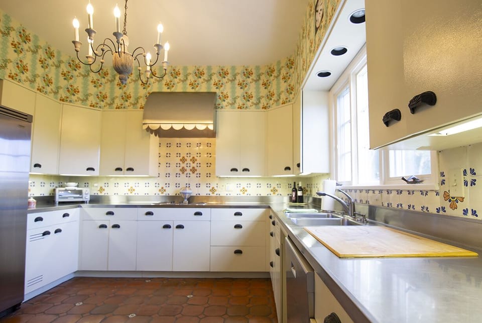 St. Charles kitchen with Viking fridge, built-in cutting board and blender.
