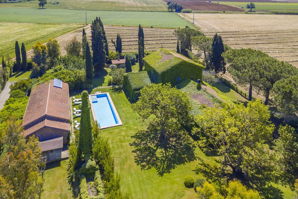 The pool, the tipical Villa, the summer living and the well kept garden