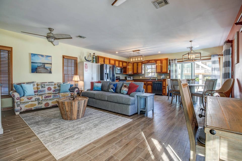 Experience a seamless flow with the open concept layout extending from the kitchen to the living room, fostering a connected and spacious ambiance.