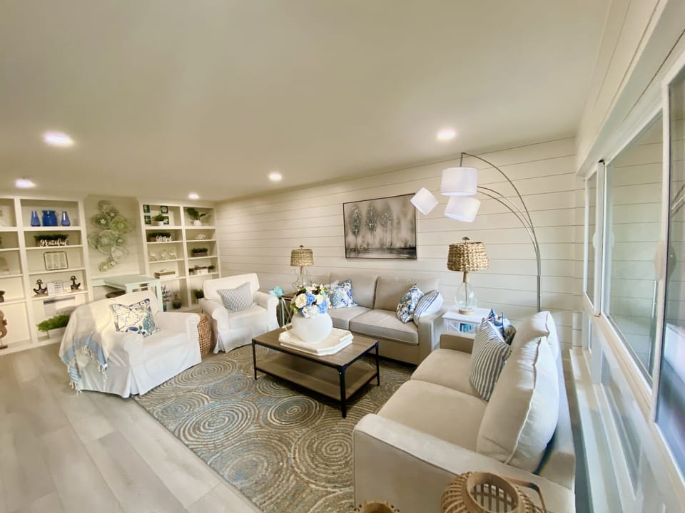 Luxurious living room with 70 inch tv., fireplace, workstation!